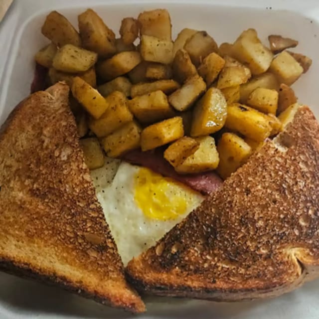 2 Eggs Meat & Home Fries.